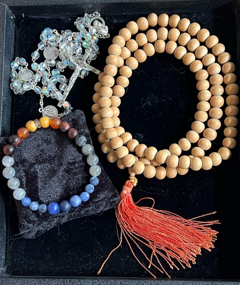 Tray of crystal, mala, rosary